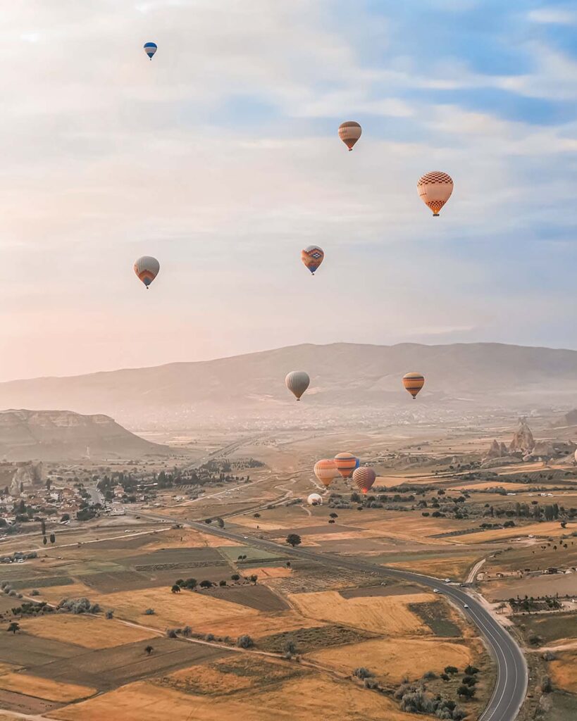 flying in sky many bright colored beautiful balloo HW5NDVW