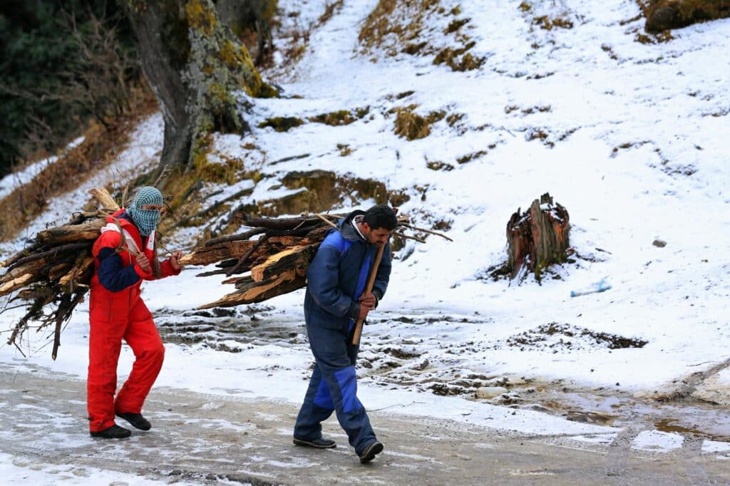 Kilimanjaro Porter and Guide Tips — Porters carrying gear mountain